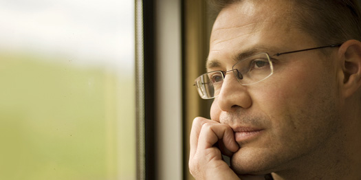 PTSD Man Thinking at Window