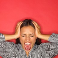 Woman In Denial Yelling And Covering Her Ears - Addiction Hope