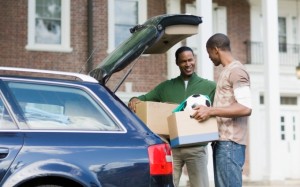 Father Helping His Son Mover Into The Dorm