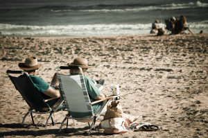 An old couple relaxing on the beach