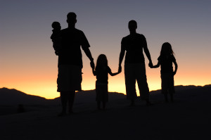 Family holding hands and overcoming Alcoholism