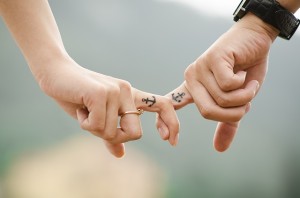 Man and woman in Recovery holding hands