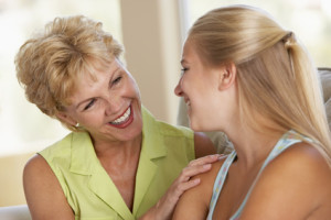 Mother And Daughter Together At Home discussing a Genetic Predisposition to alcoholism