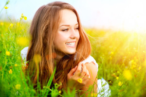 Girl in Recovery lying on Green Grass