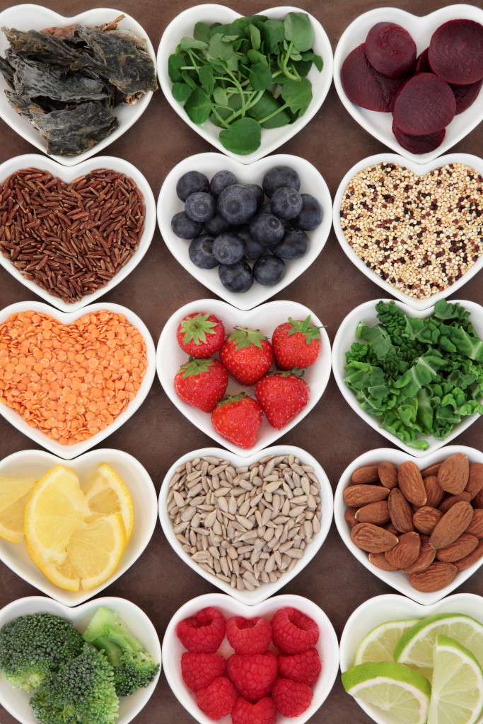 Health food for a skincare diet in heart shaped porcelain bowls.