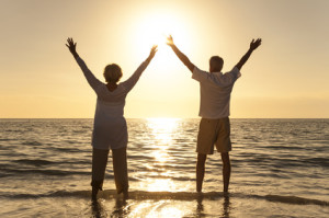 Senior Man & Woman Couple Sunset on Beach