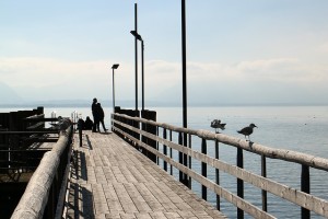 person walking on a pier pleased with Addiction Support Groups