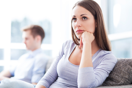 Woman thinking about shattered relationship