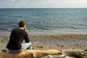 Man looking out to sea