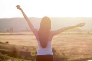 cheering woman open arms ready to Trust 