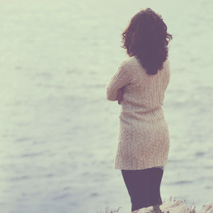 Woman standing on the beach