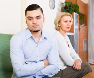 Conflict of aged woman and young guy