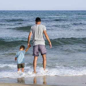 Father and son at beach