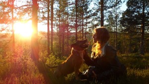 girl and dog in sunrise