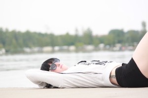 girl laying on beach