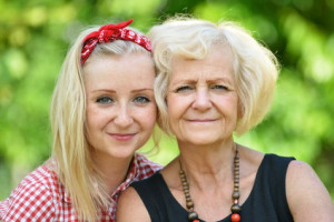 Mother and daughter in park.