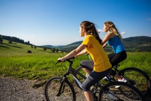 young women biking