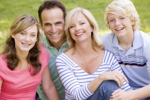 Family poseing for a family picture.