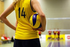 Girl getting the Benefits of Exercise in Addiction Recovery by playing volleyball