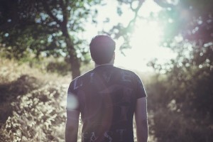 Man walking in forest thinking about his new Healthy Eating Habits