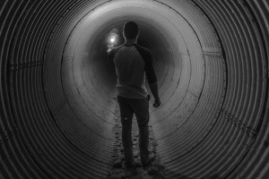 Man in underground tunnel