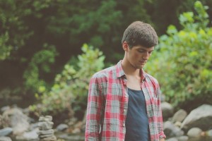 young guy in woods