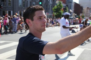 guy handing out information in the street