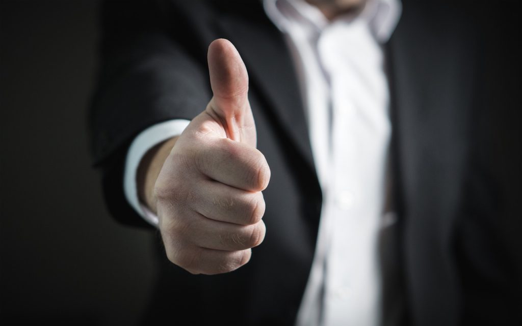 Man with his thumb up participating in Dry January