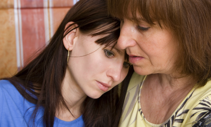 Mother Consoling Daughter After Discussing Misusing Prescription Drugs