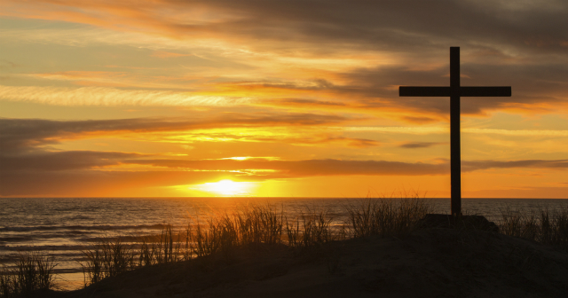 Christian Cross On Hill At Dawn