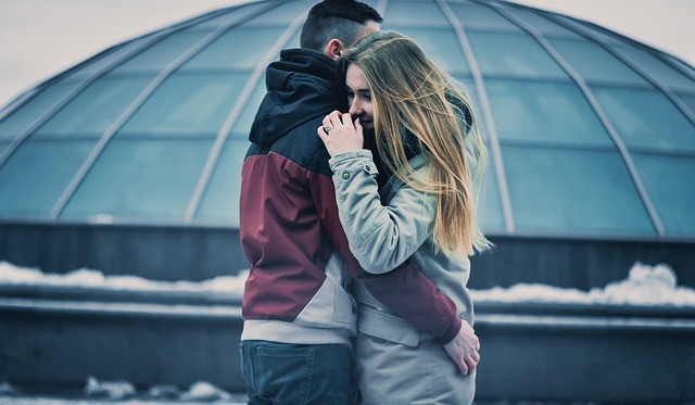 Husband hugging spouse struggling with a drug addiction