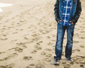 Man on beach in recovery