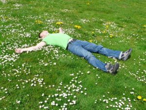 Man in grass for rest