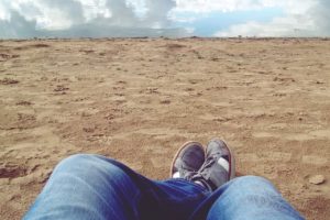 Sitting in the sand