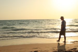 Man in addiction recovery on the beach