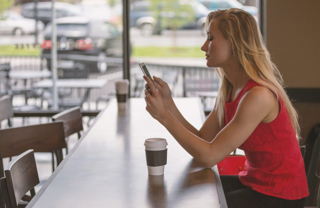 Woman drinking coffee thinking about her Intimacy Issues