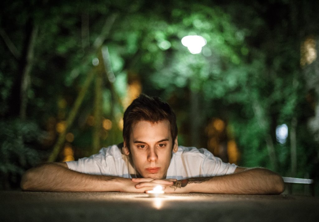 Man staring at light