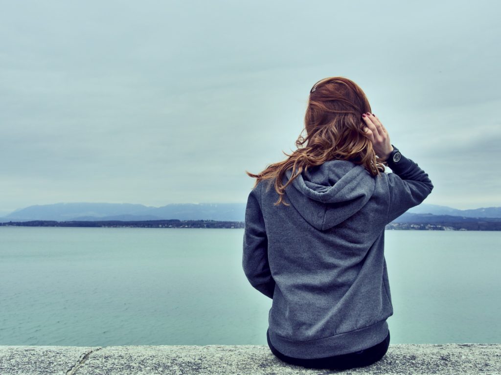 Woman on ledge thinking about Banning Fentanyl