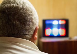 Man watching TV and recovering from a Klonopin Addiction