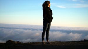 Woman above the clouds