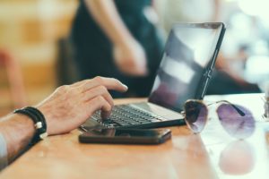 Man using computer and fighting Computer addiction