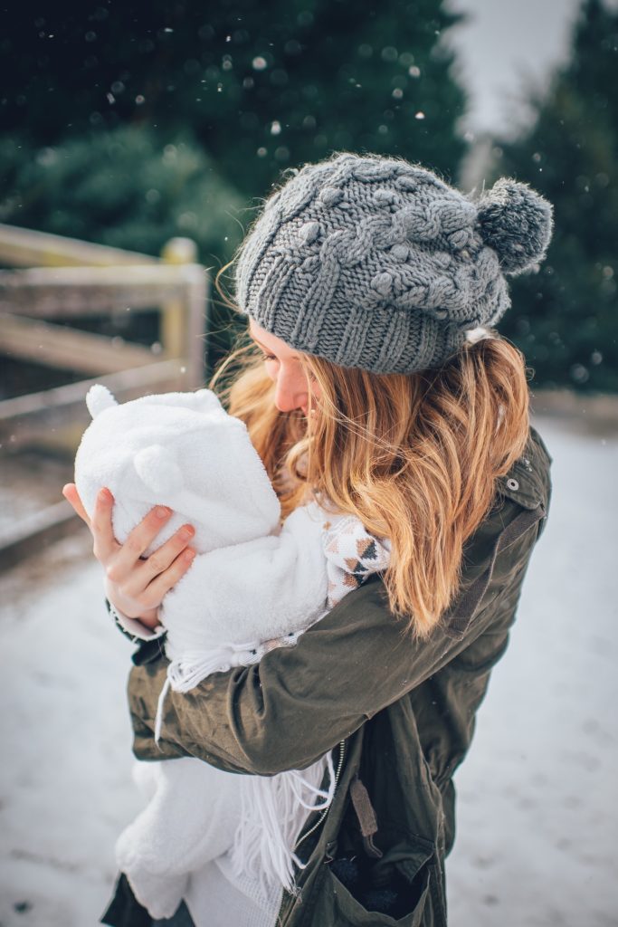 Mother and baby in snow