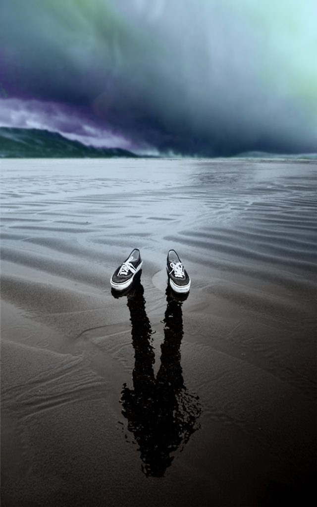 Shoes in the sand and shadow