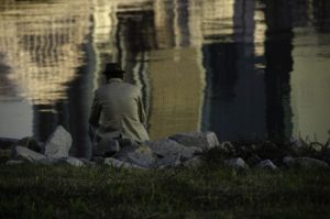 Man by the lake