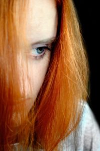 Woman looking away struggling with Managing Depression