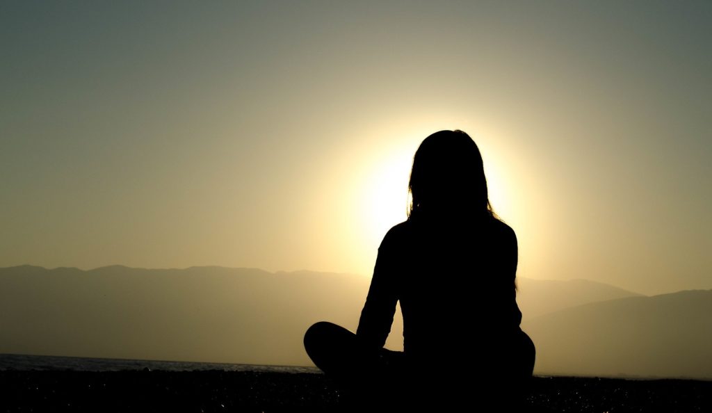 Woman Watching The Sunset