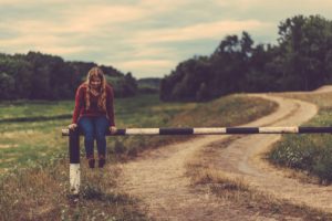 Girl on gate