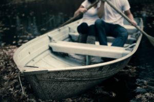 Couple in a boat discussing Sexual Addiction Recovery