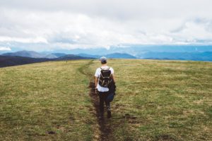 Man climbing mountain