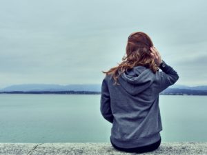 Girl considering therapy for anxiety and addiction